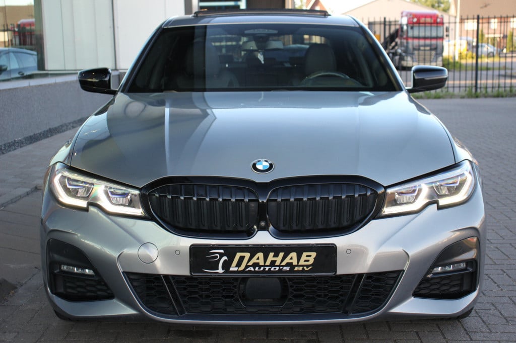 BMW 3-serie 330e high executive m-sport | schuifdak | laser | h&k | el. sto