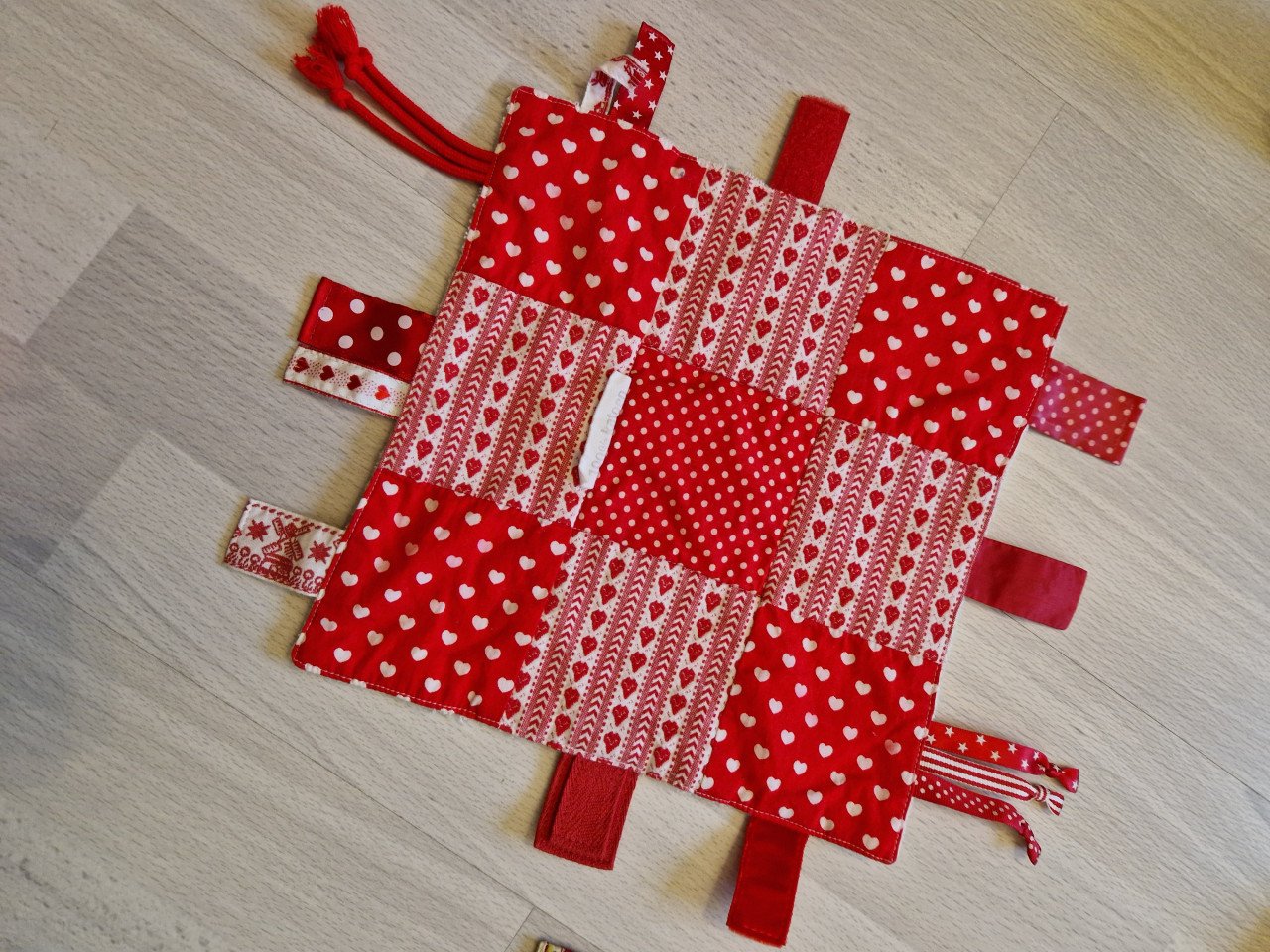 Boxzak met babyspeelgoed