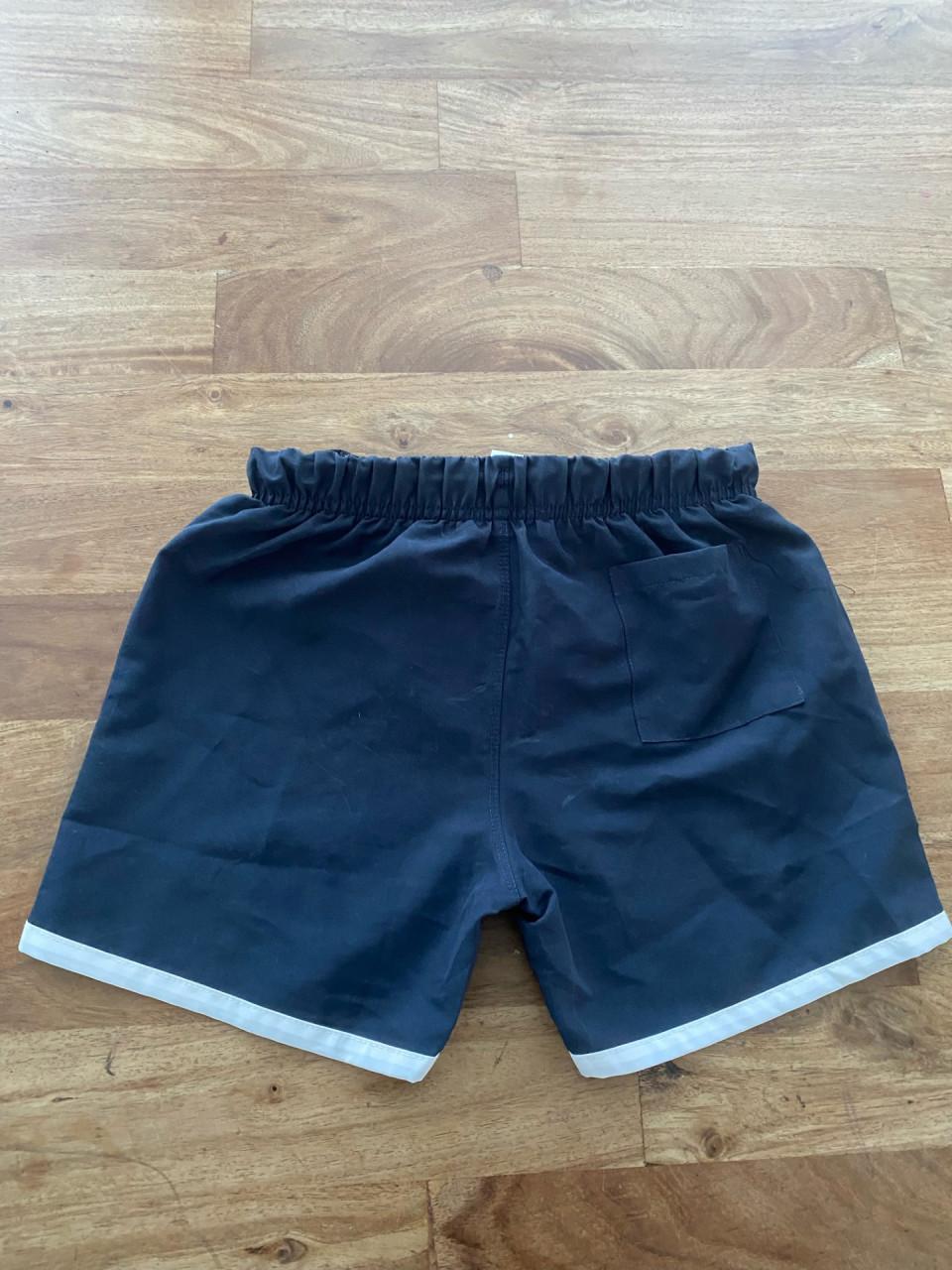 Zwembroek van Ajax maat 110-116.