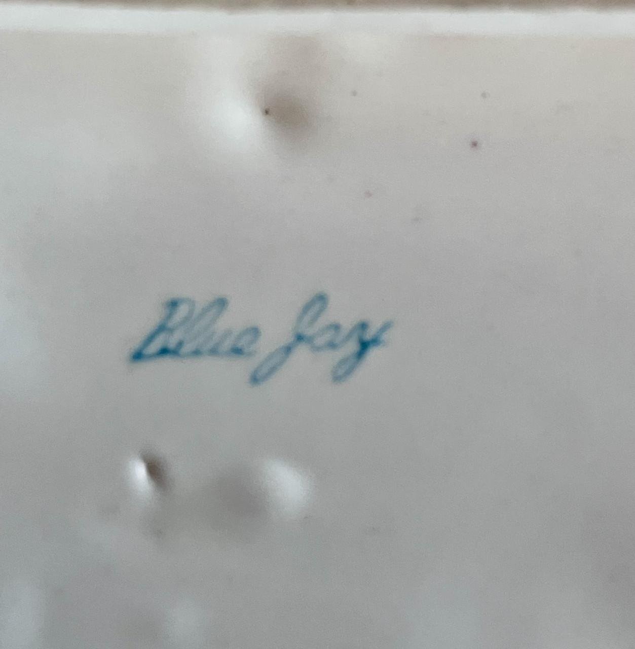 Vintage porseleinen wandbord “Blue jay”