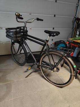 Heren stadsfiets met krat te koop