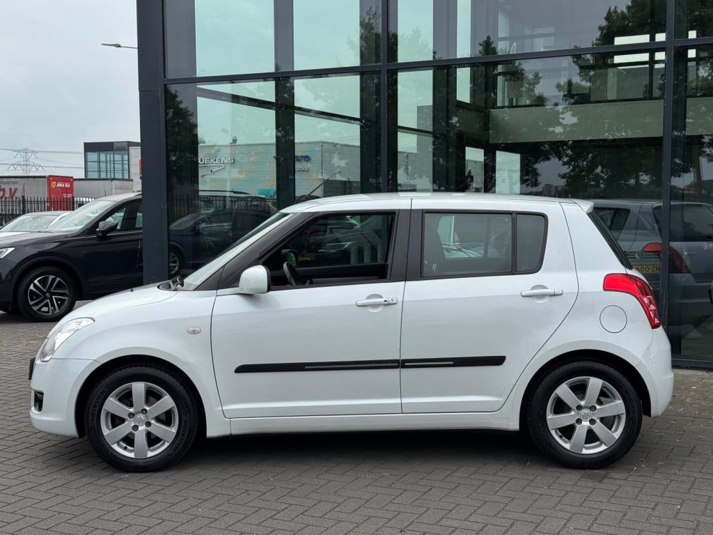 Suzuki Swift 1.3 exclusive* airco * 5drs * carplay