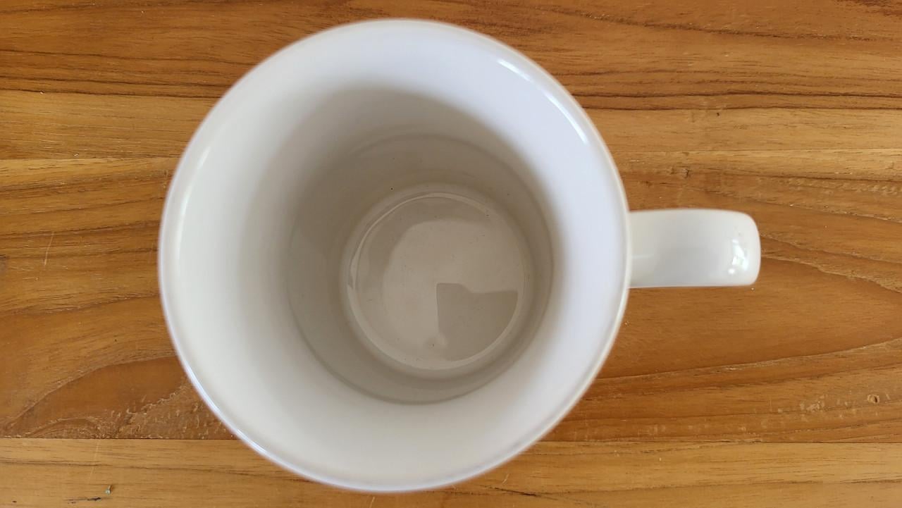 Mok Staffordshire voor Douwe Egberts Pluk van de Petteflet