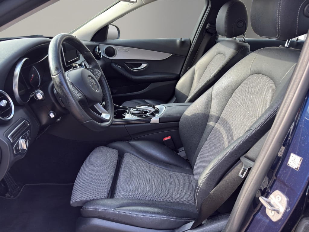 Mercedes-Benz C-Klasse c 180 business solution auto | navigatie | half lede