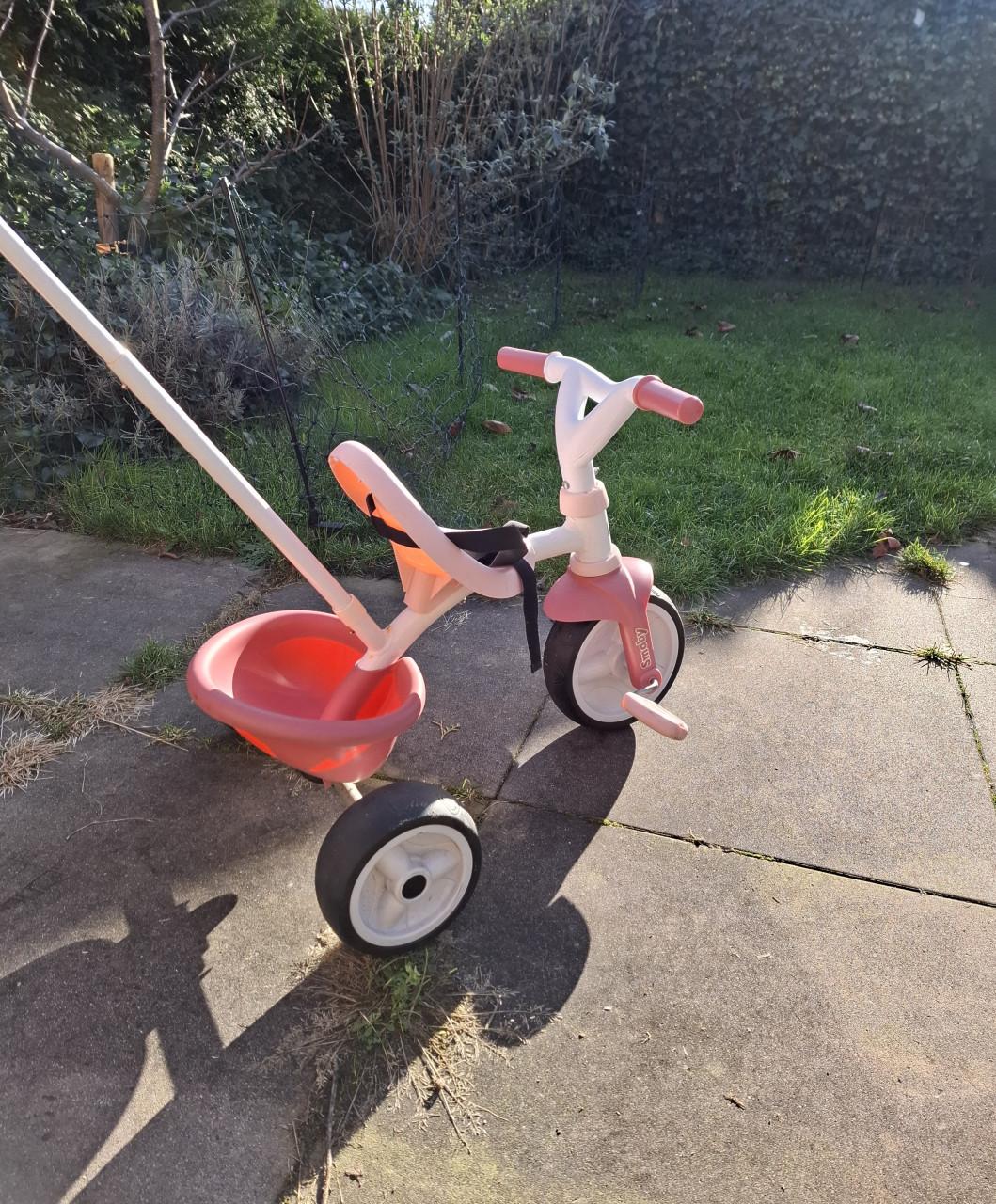 Driewieler Smoby met duwstang