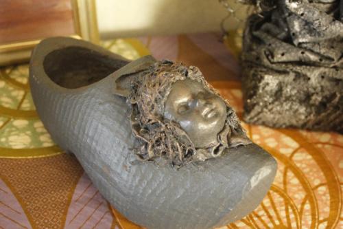 Houten kinder klomp..Met gezichtje