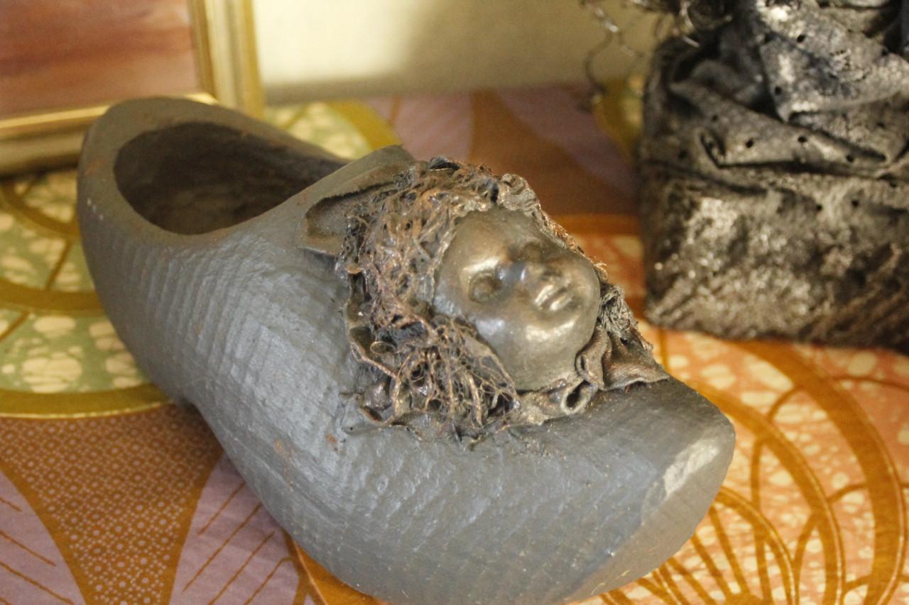 Houten kinder klomp..Met gezichtje