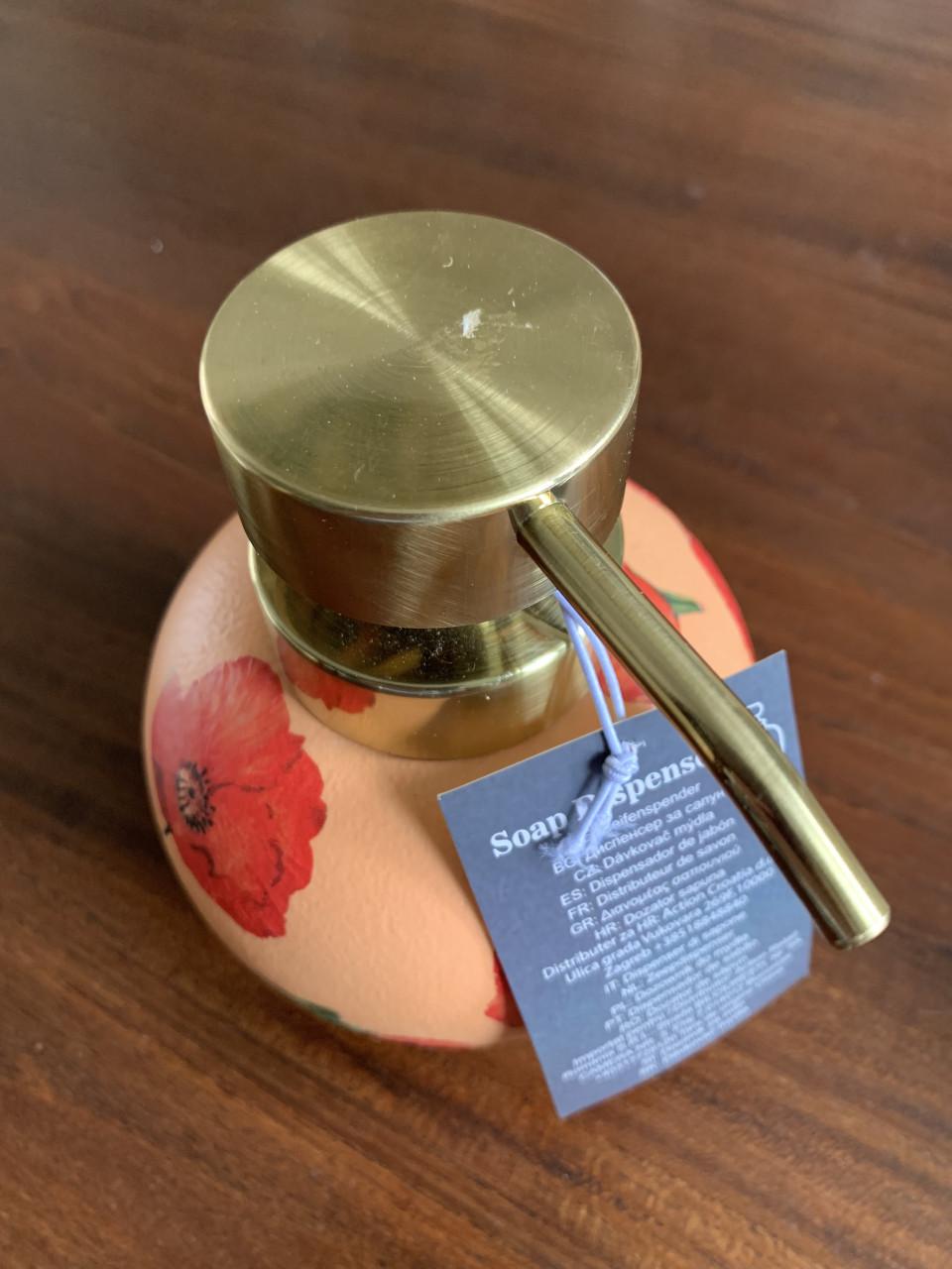 Zeepdispenser met een vrolijk klaprozen design