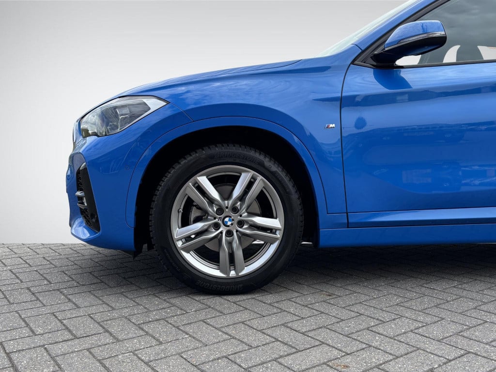 BMW X1 sdrive18i high executive m sport | trekhaak afneembaar | sportstoele
