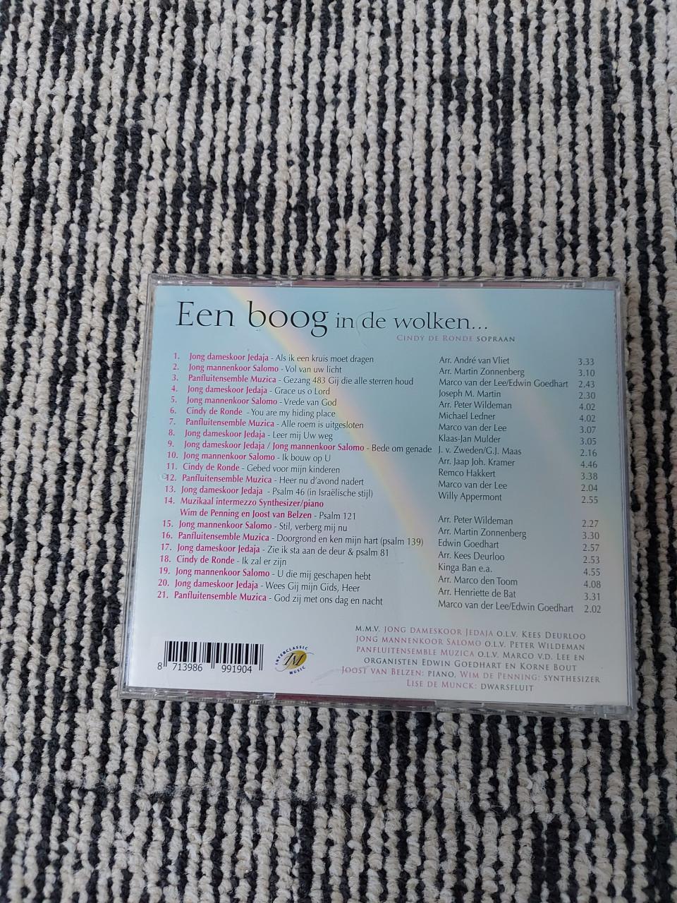 CD een boog in de wolken