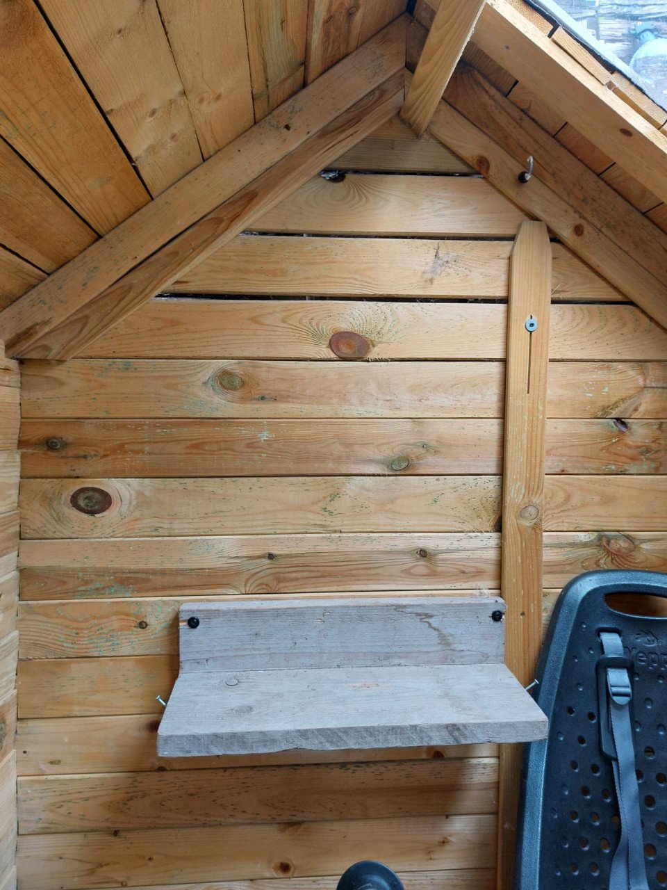 Houten kinderspeelhuisje