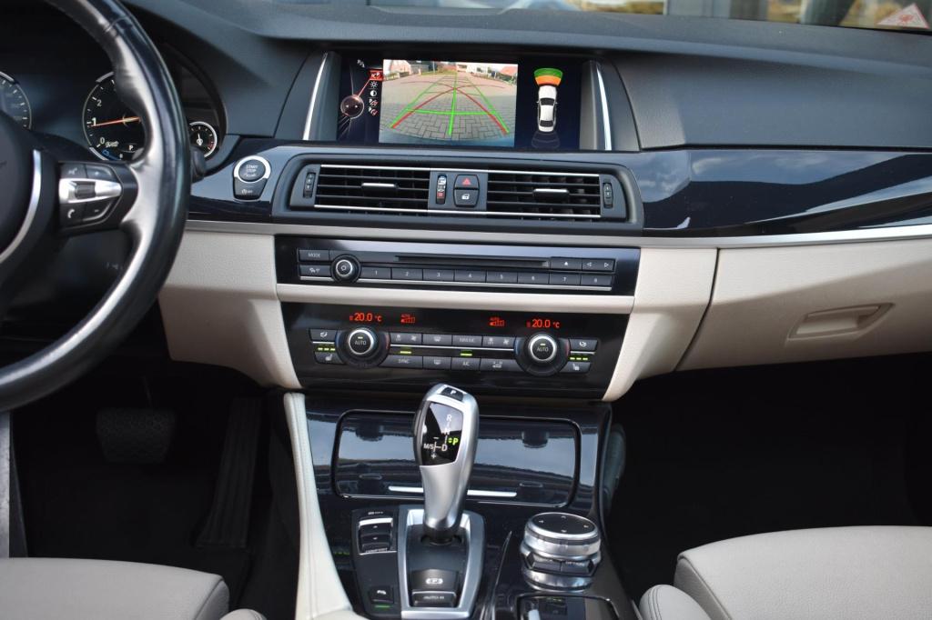 BMW 5 Serie 520i m sport | schuifdak | camera | leder | nap | adapt. cruise
