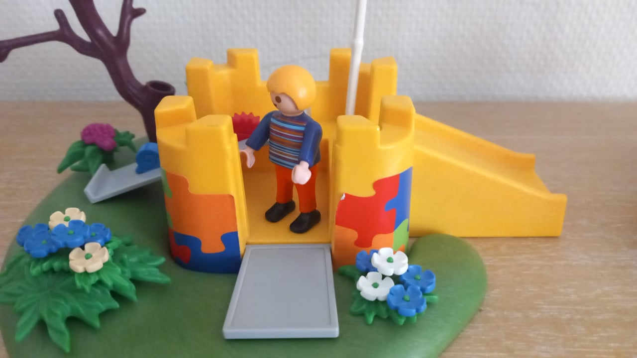 Playmobil speeltuin met draaischommel en glijbaan