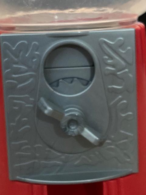 Kauwgomballen machine en vrolijke lampions met toebehoren