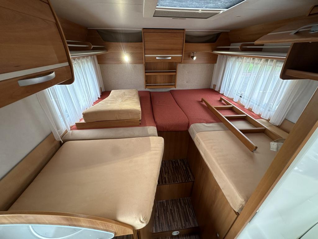 Hymer Onbekend hv 562 compacte hymer van | half-integraal met lengtebedden 