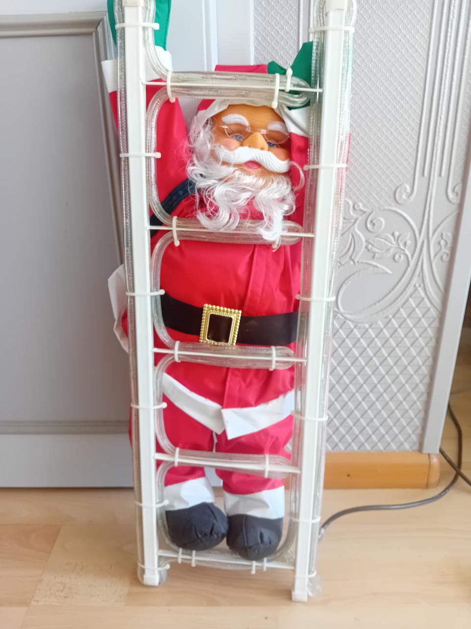 Kerstman op laddertje