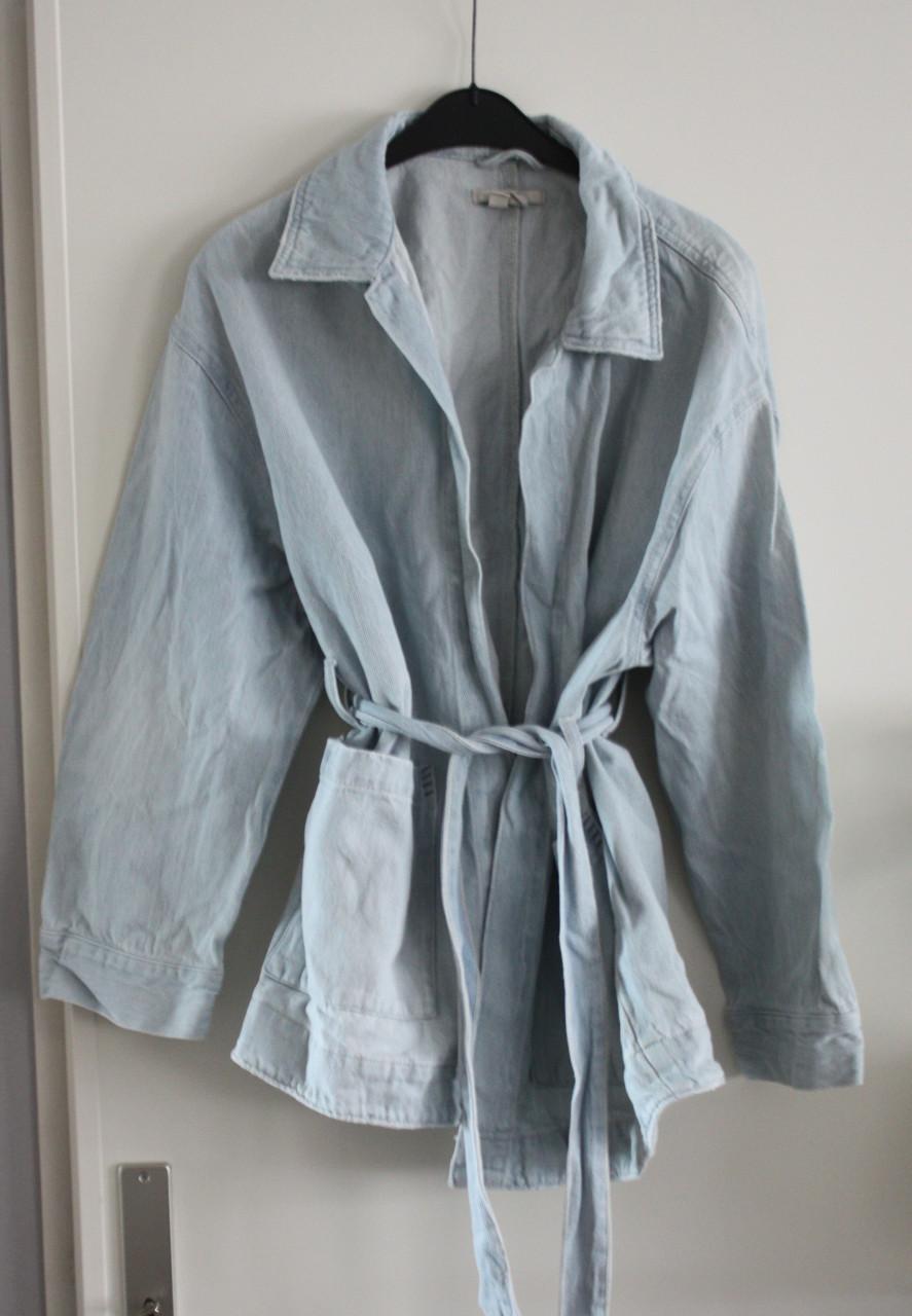 Licht blauwe spijkerjas maat L