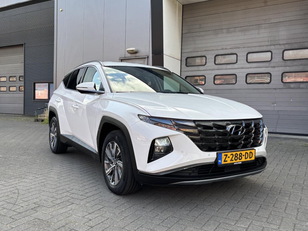 Hyundai Tucson Hybrid 1.6 t-gdi hev comfort smart | navigatie | camera | ap