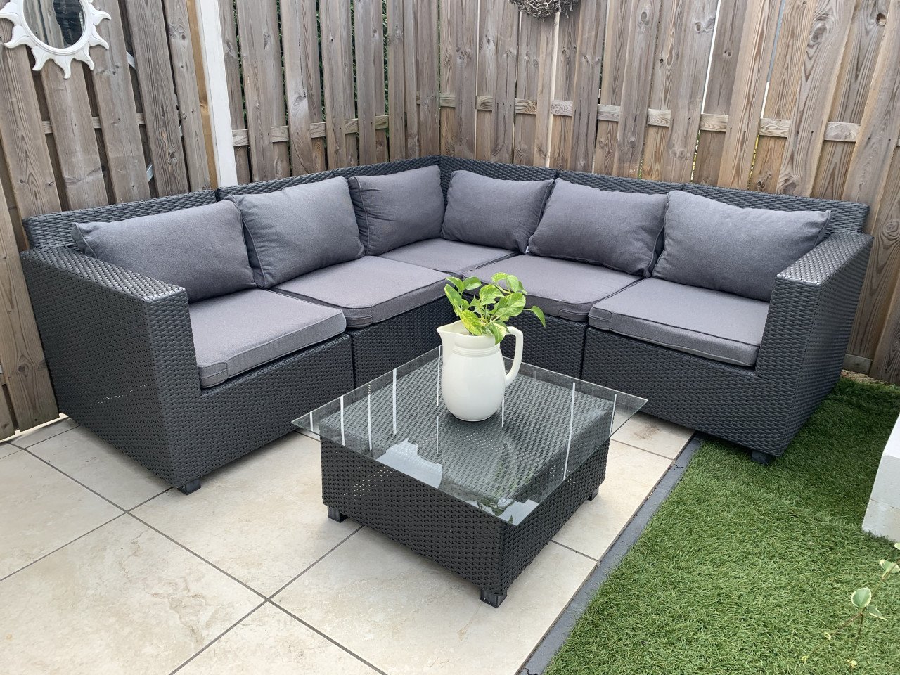 Loungeset zwart wicker, plus tafel plus kussens