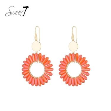 Oorbellen met een mooie rand, ingelegd met oranje steentjes