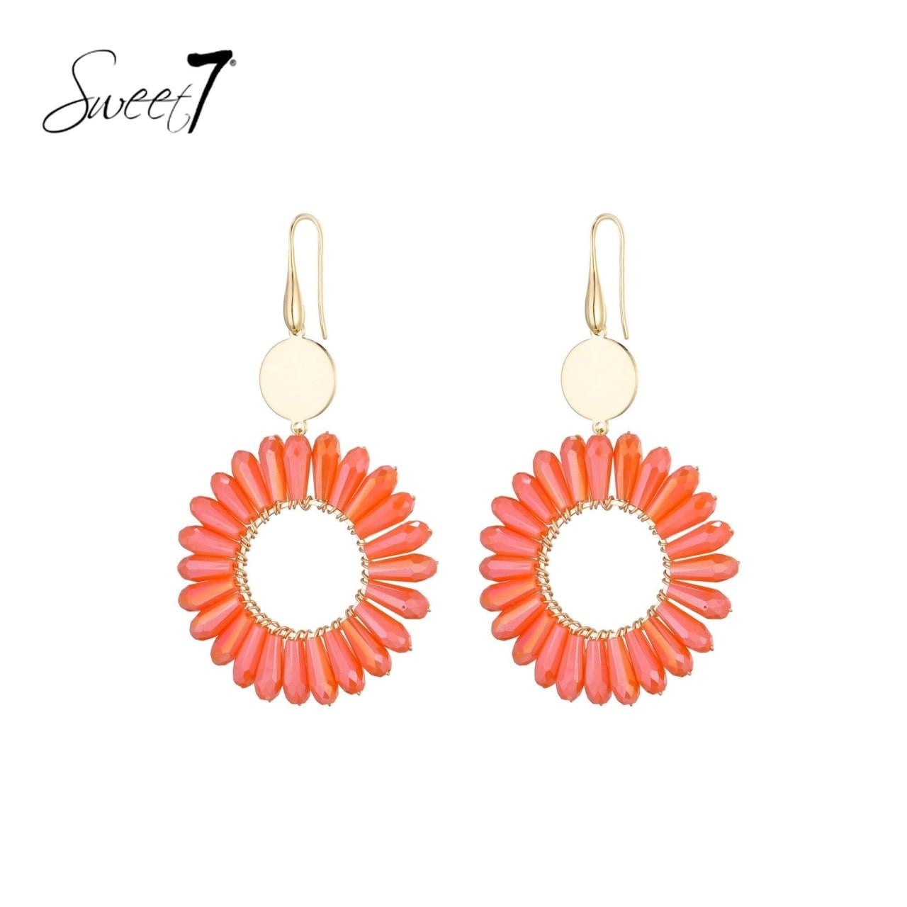 Oorbellen met een mooie rand, ingelegd met oranje steentjes