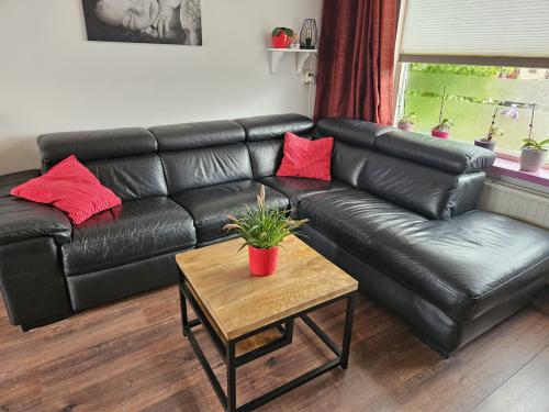 Luxe lederen hoekbank met elektrische zetel en HR koudschuim vulling