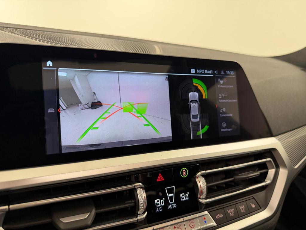 BMW 3-serie 330e m-sport | schuif/kanteldak | elektrische stoelen | verwarm