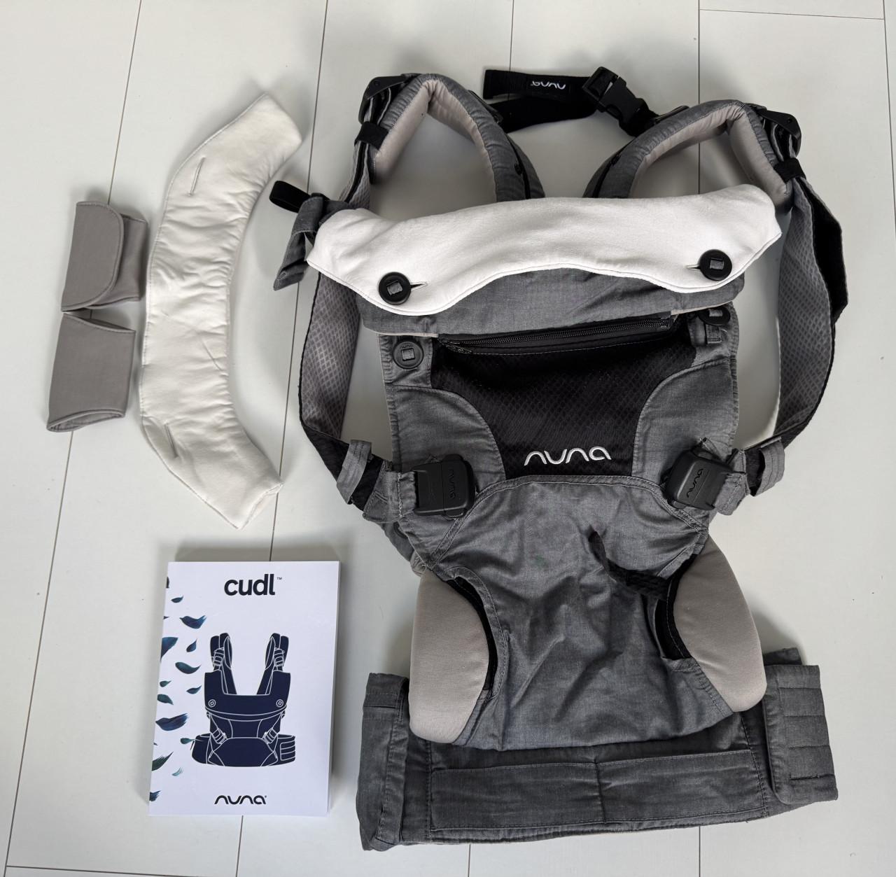 Nieuwstaat: Nuna Cudl draagzak, compleet