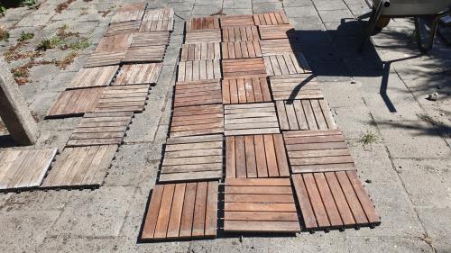 Acacia terras tegels 104 stuks € 290