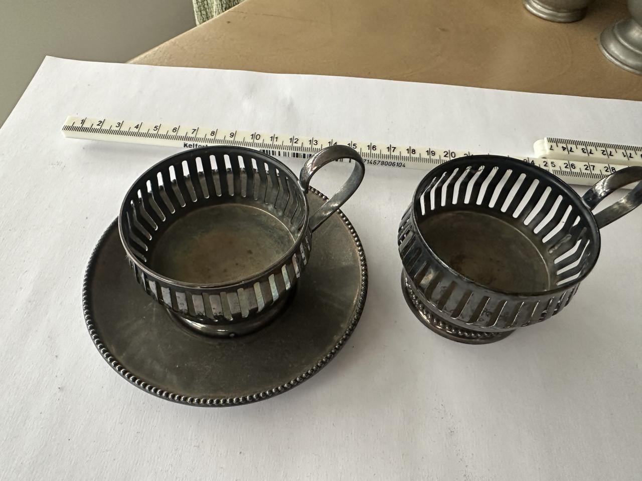 Zilveren kop en schotelhouder