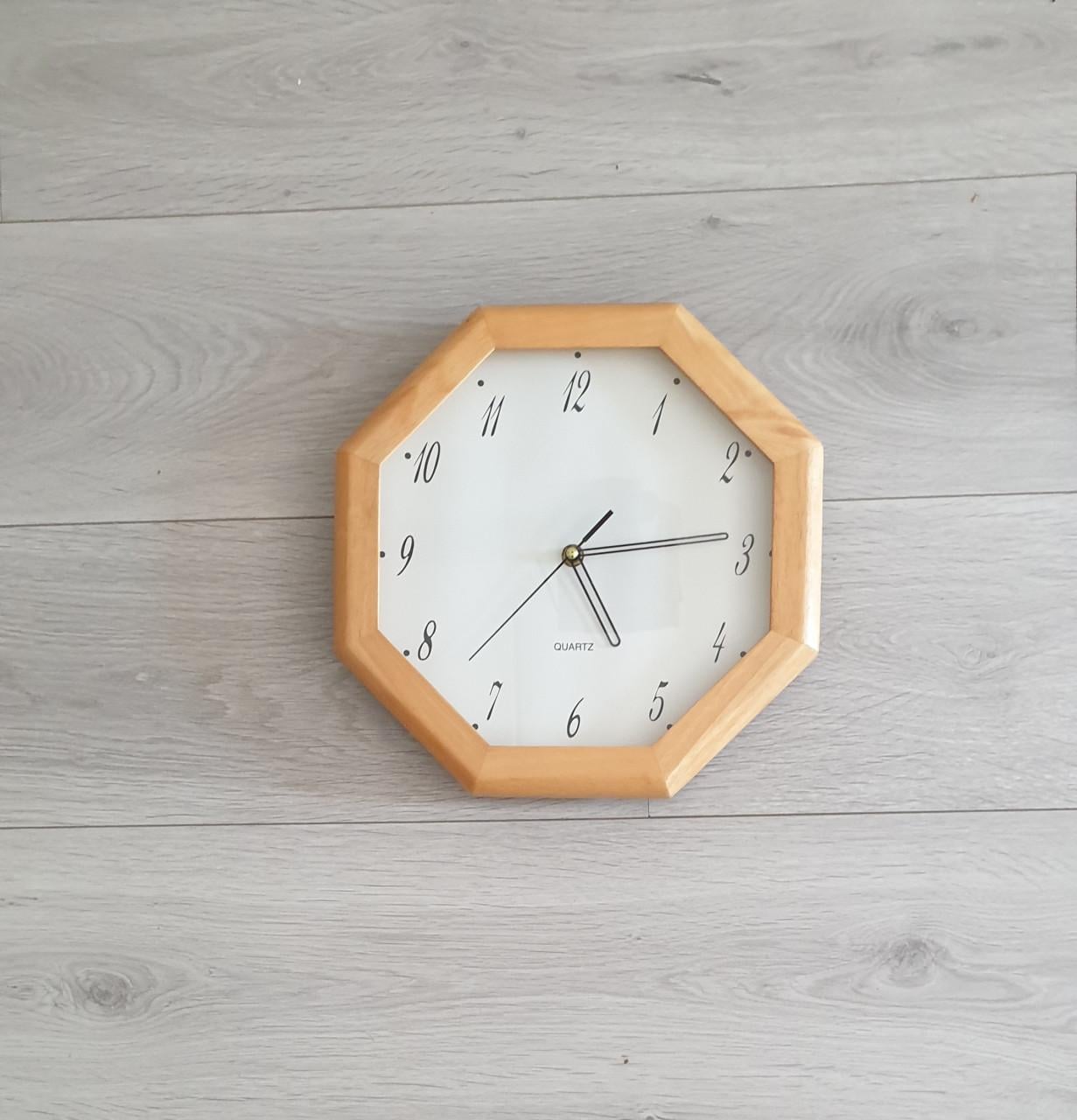 Houten wandklok