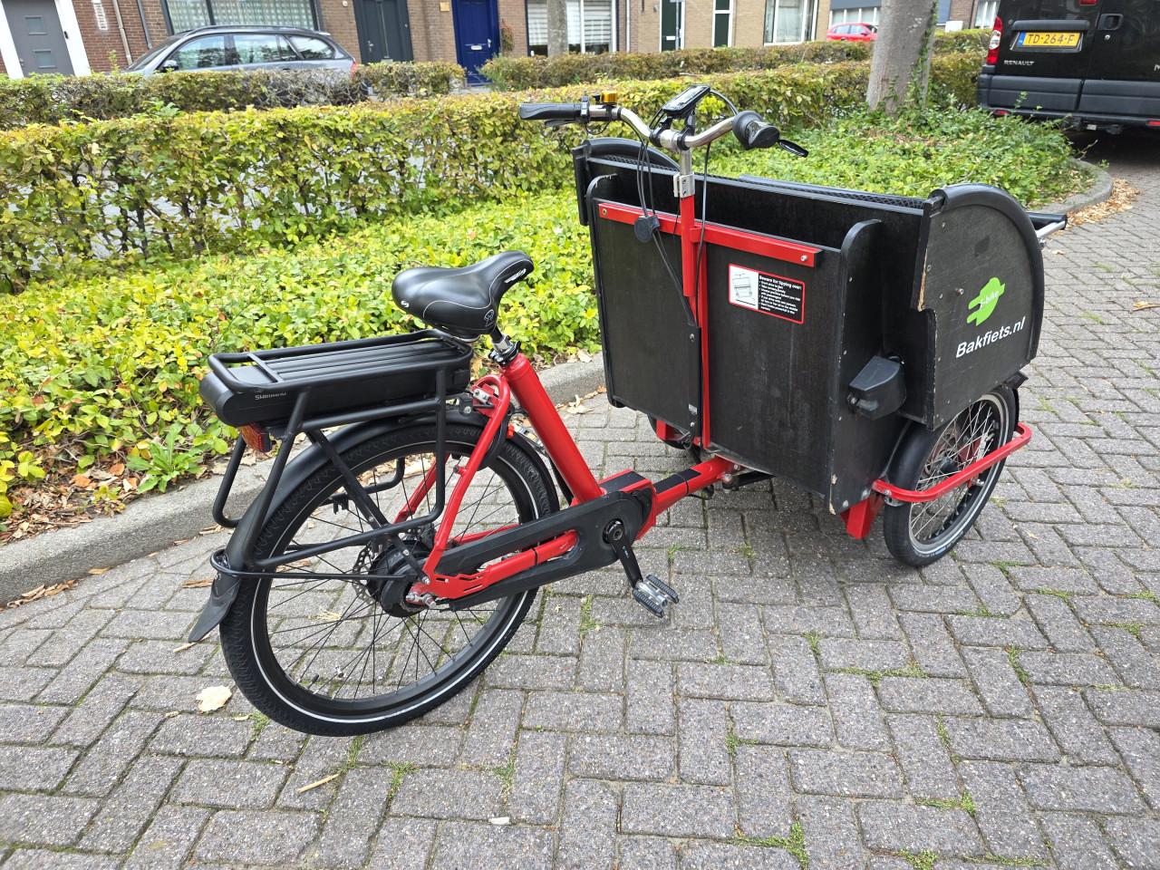 Keurig nette elektrische riksja bakfiets met Shimano middenmotor