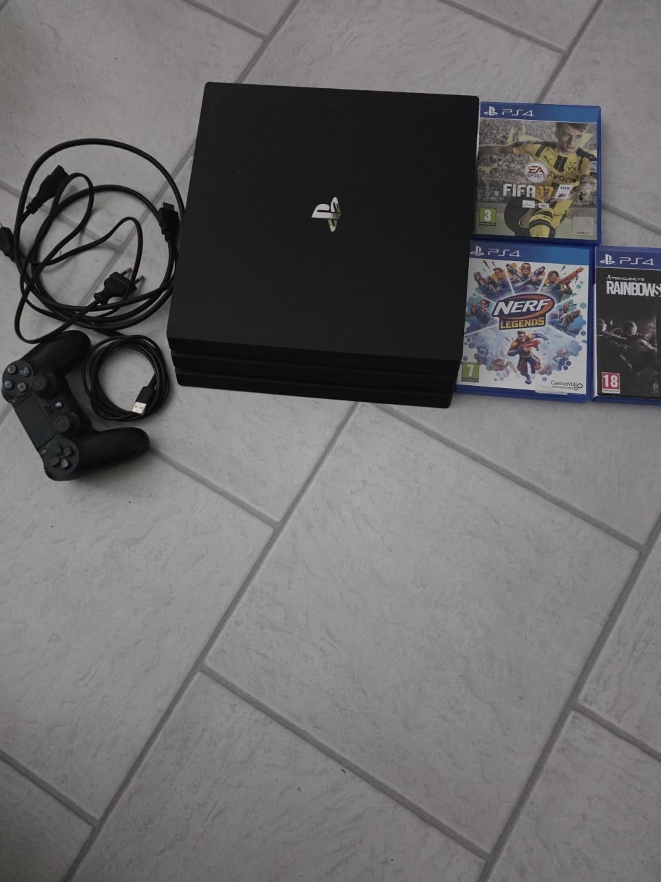 Te koop ps4 pro met 3 spelletjes