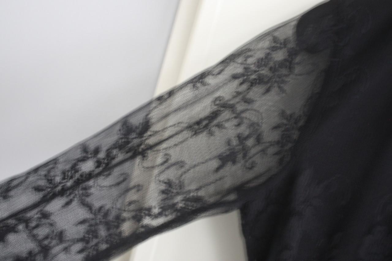 Zwarte top met kanten mouwen