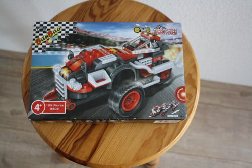 Te koop bouwpakket - rode raceauto - VERKOCHT