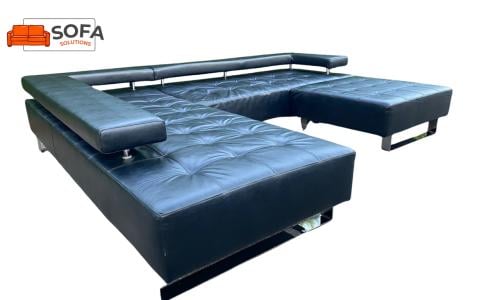 Montèl Cipriani zwart leren hoekbank met hocker en gratis levering