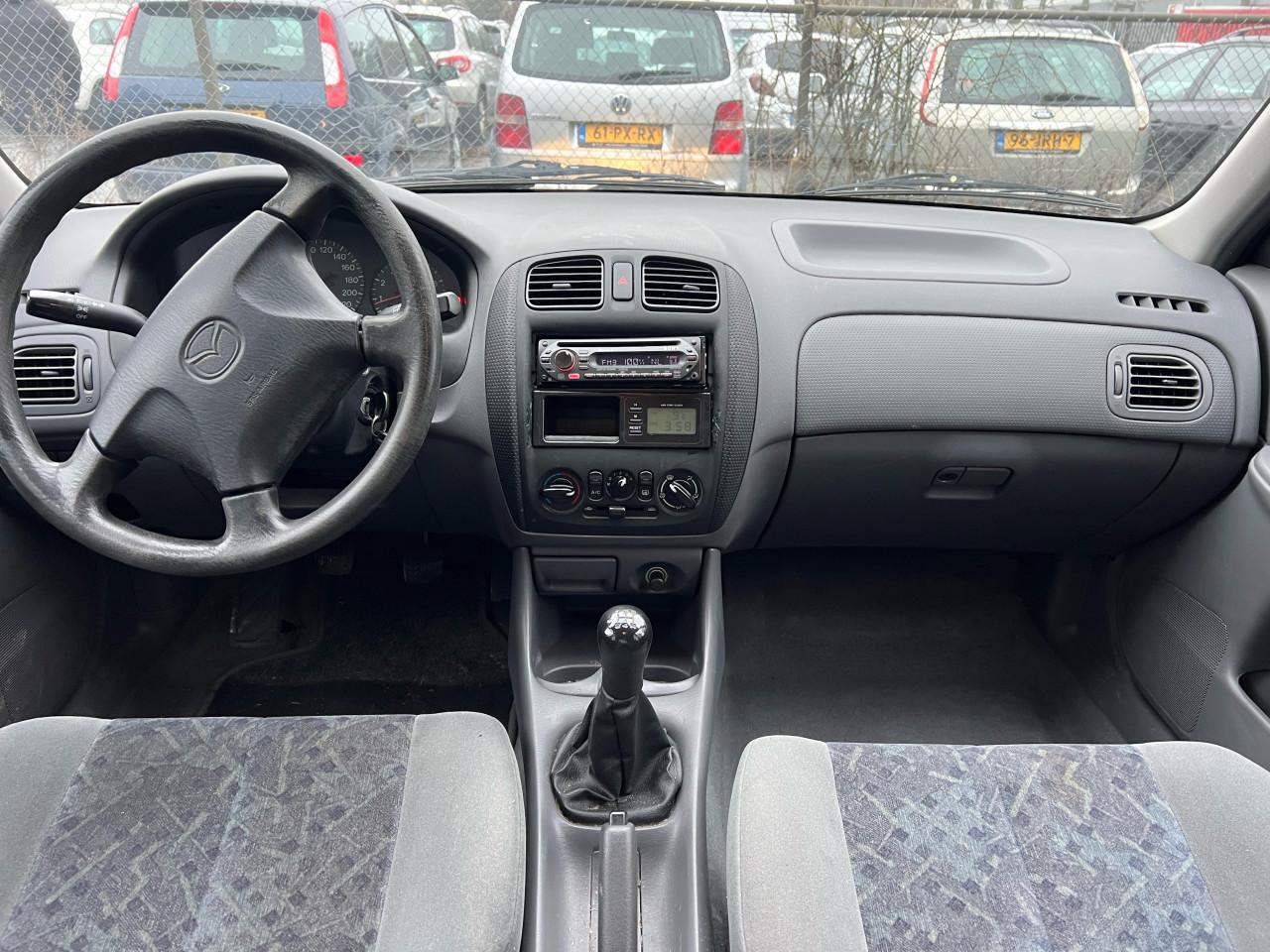 Mazda 323- 1.5 GLX 146.073 KM Airco