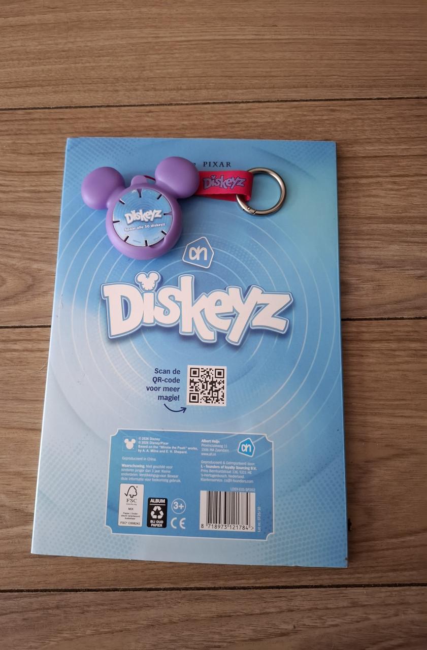 Diskeyz map met paarse sleutelhanger