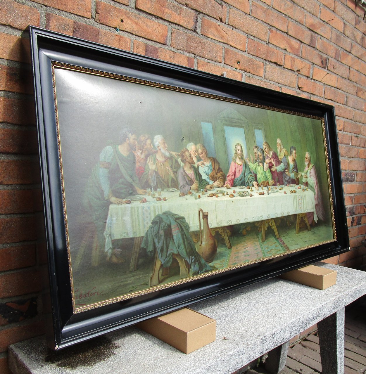Prent van Het laatste avondmaal in een mooie zwarte lijst.
