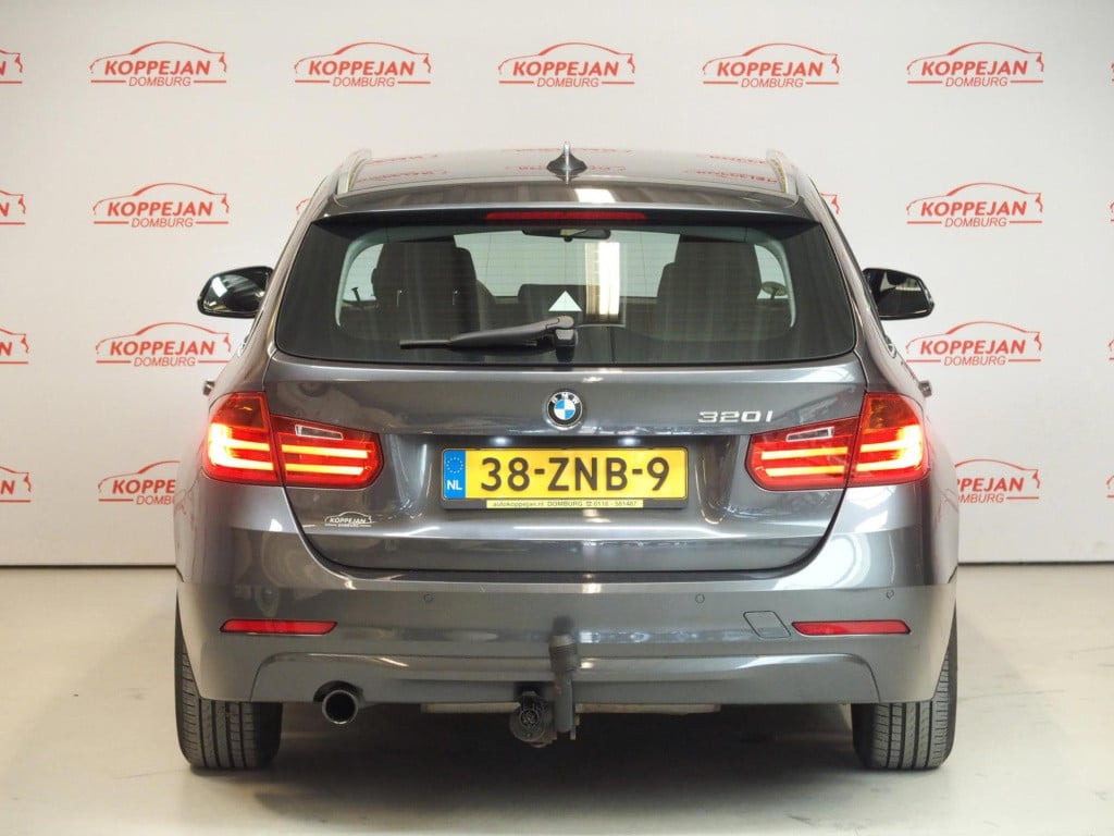 BMW 3-serie touring 320i high executive nl auto, leder, trekhaak