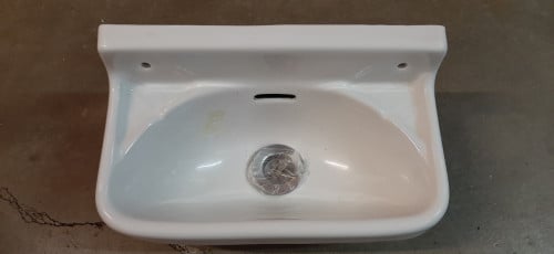 Kleine wastafel voor toilet