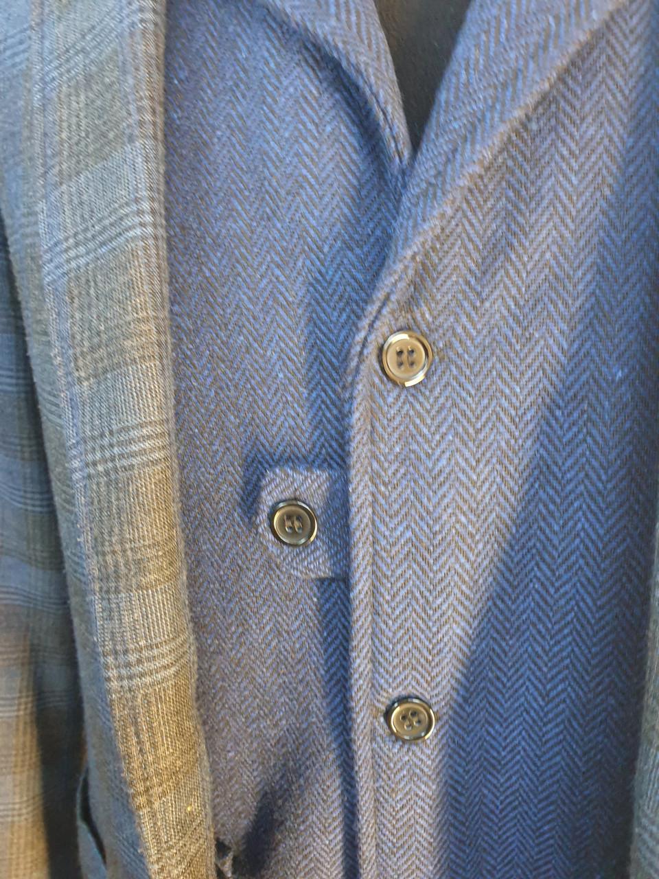 "Vlot" Colbert met vest.