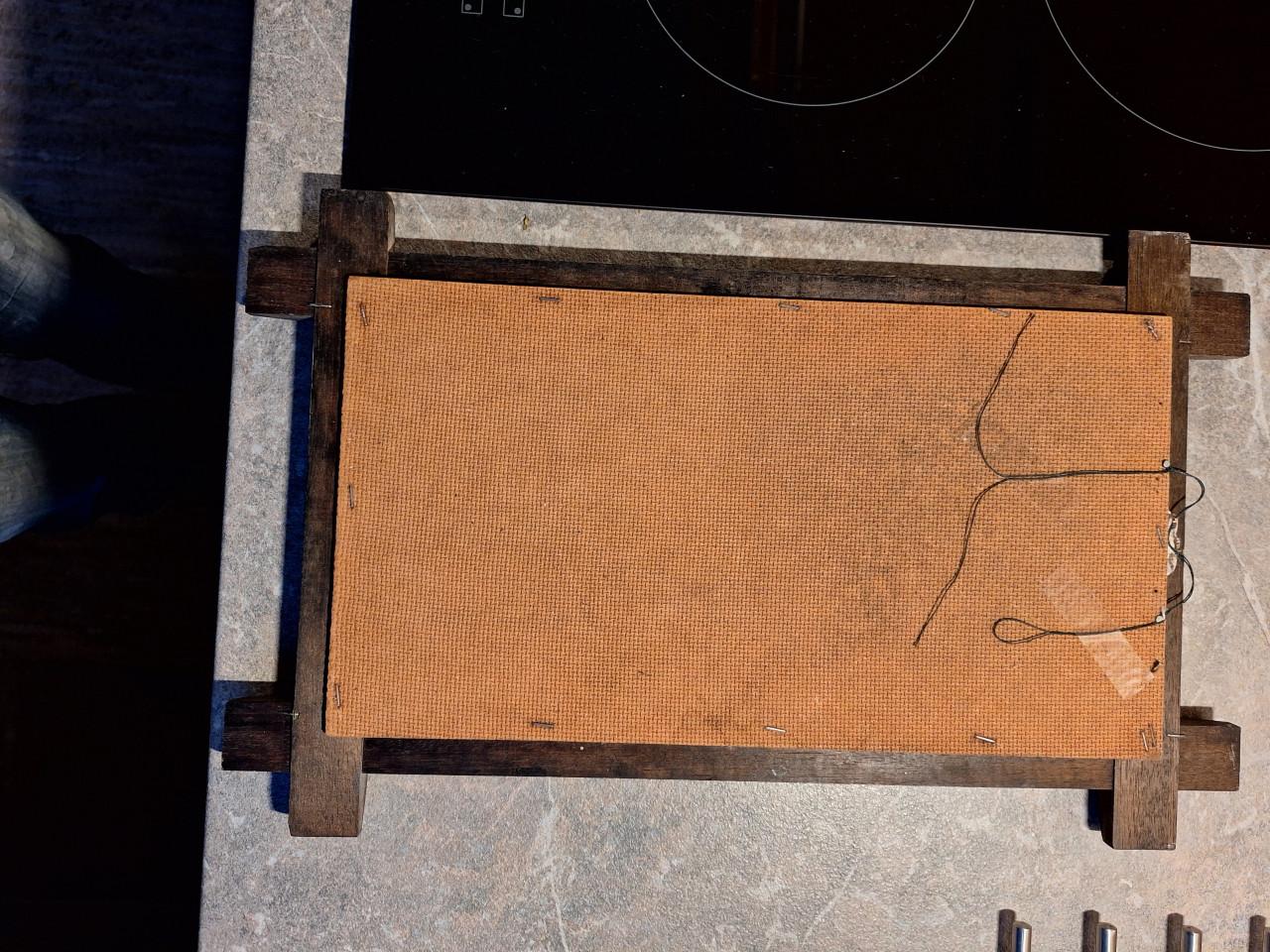 Tegeltjes ingelijst.