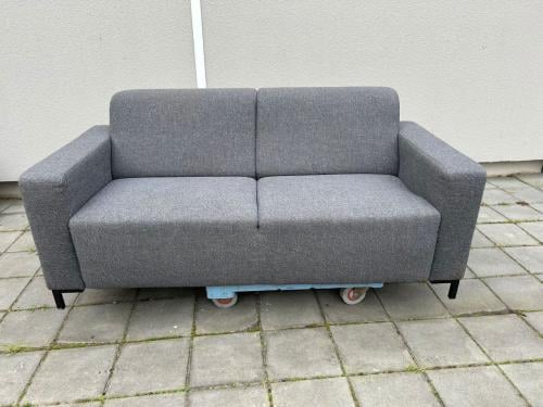 Grijze tweezitsbank 183x85cm met lichte beschadiging