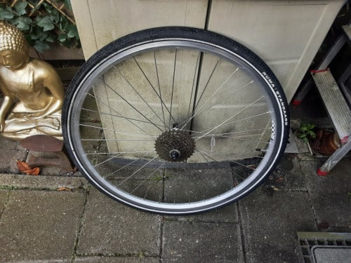 28 inch shimano achterwiel, 7 speed cassette, uitvalnaaf