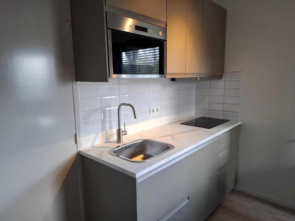 Twee gestoffeerde appartementen met eigen tuin