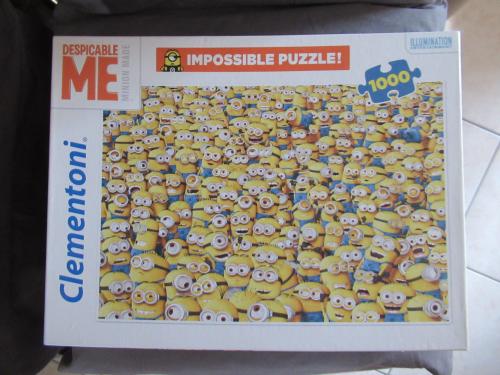 Mooie leuke volledige minionpuzzel van 1000 stukjes, zo goed als nieuw.
