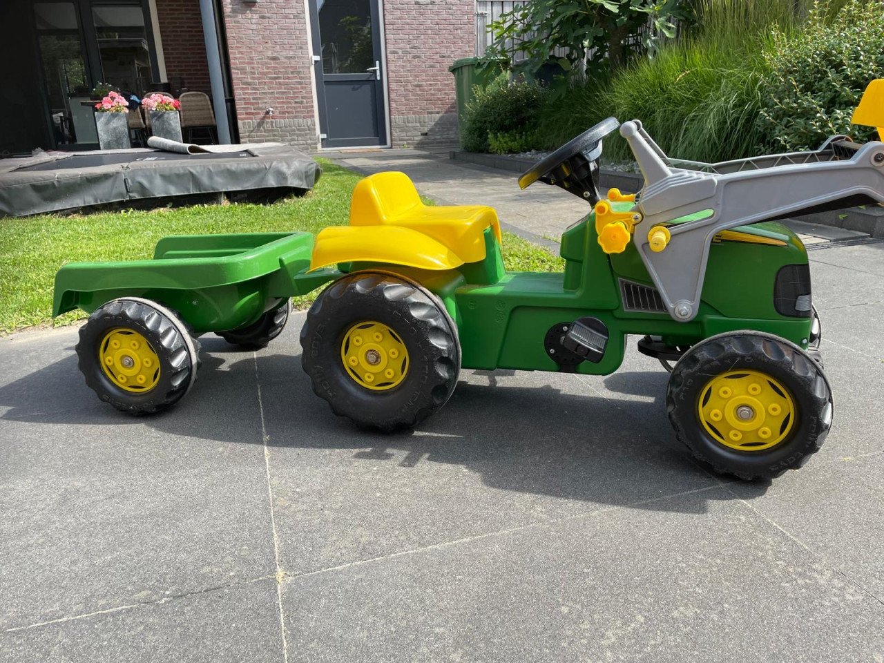 Speelgoedtractor met aanhanger