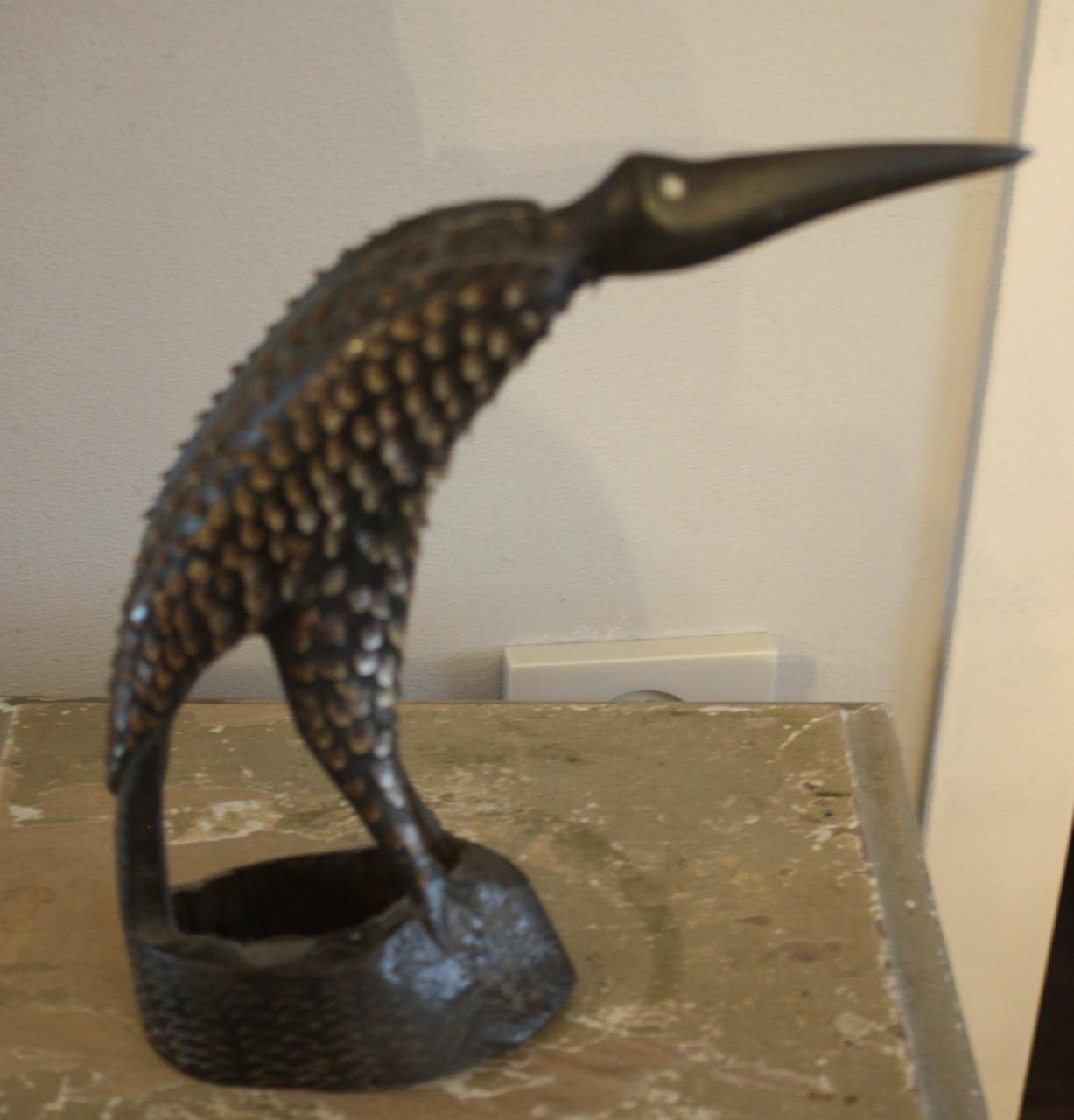 Houtsnijwerk vogel met stekels