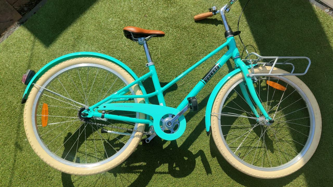 Zo goed als nieuw: Turquoise Volare Melody 24 inch meisjesfiets